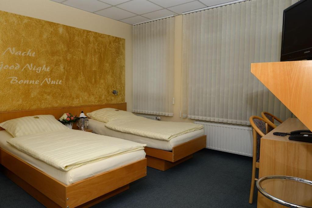 Hotel Alberga Mettmann Pokoj fotografie